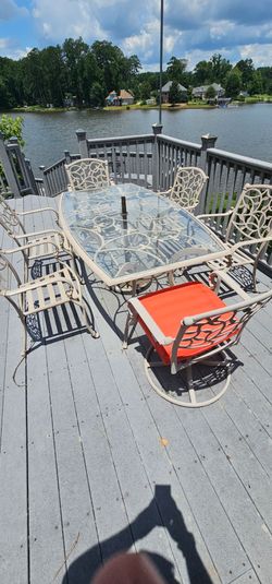 Hampton Bay outdoor dining set with cushions and umbrella
