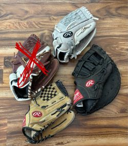 Assorted Rawlings baseball/softball mitts