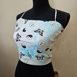 Size L Rue 21 Blue Tie Dye Butterfly Smiley Faces Ying Yang Design Lace Up Spaghetti Strap Summer Halter Crop Top. 73% Rayon, 23% Nylon & 18% Spandex.