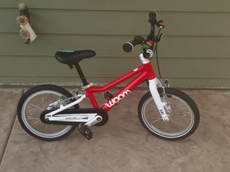 Woom 2 kids 14 inch light weight aluminum kids bike only ridden a couple times like new