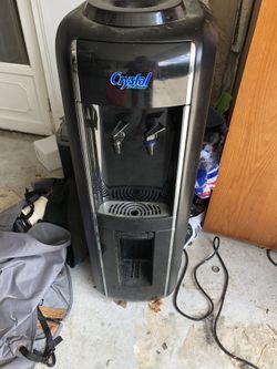 Water cooler and 5 jugs