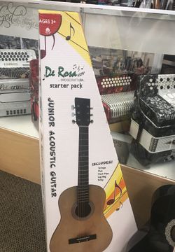 DE ROSA KIDS STARTER PACK. JUNIOR ACOUSTIC GUITAR. MADE OUT OF ROSEWOOD. INCLUDES: 1 ACOUSTIC GUITAR, STRINGS, PITCH PIPE, GIG BAG, PIC AND STRAP. ON