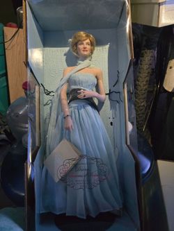 Princess diane porceline doll the blue dress $150 dollars the other 80 dollars