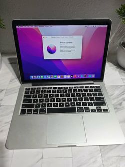 Reliable silver aluminum laptop with a 13-inch Retina display. This Apple MacBook Pro has a 2.5 GHz Dual-Core Intel Core i5 processor and 8 GB of 1600