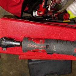 a Snap-on 14.4V 3/8" Drive RED MicroLithium Cordless Ratchet