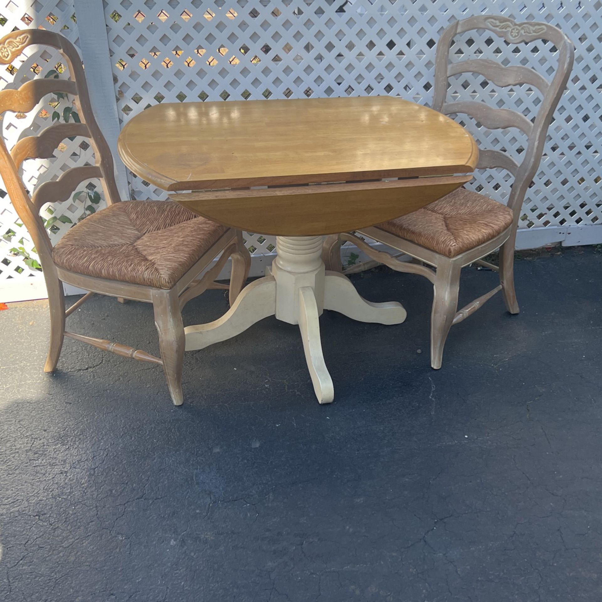 Butcher Block Pedestal Table & 2 Ladder Back Chairs With Straw Seats 42”round Open & 26” Closed & 29” Tall 