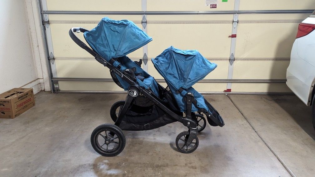 Baby Jogger City Select Double Stroller with 2 teal seats