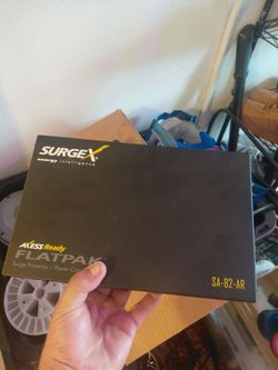 This is a SurgeX SA-82-AR FlatPak surge protector and power conditioner