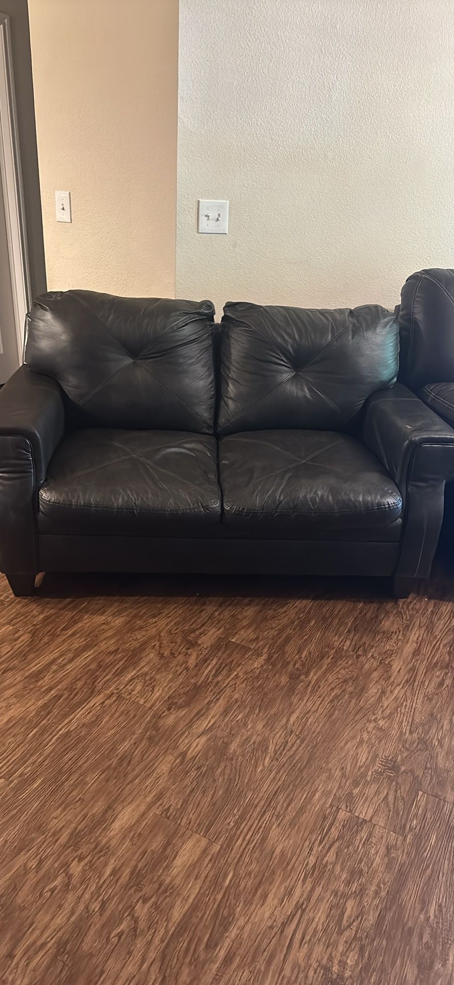 Loveseat 66” long 36” wide and 33” Brown 