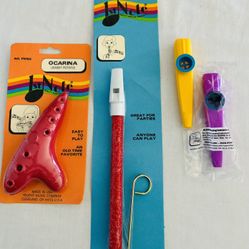 2 Kazoo’s, 1 Slide Whistle, 1 Ocarina Instruments To Play.
