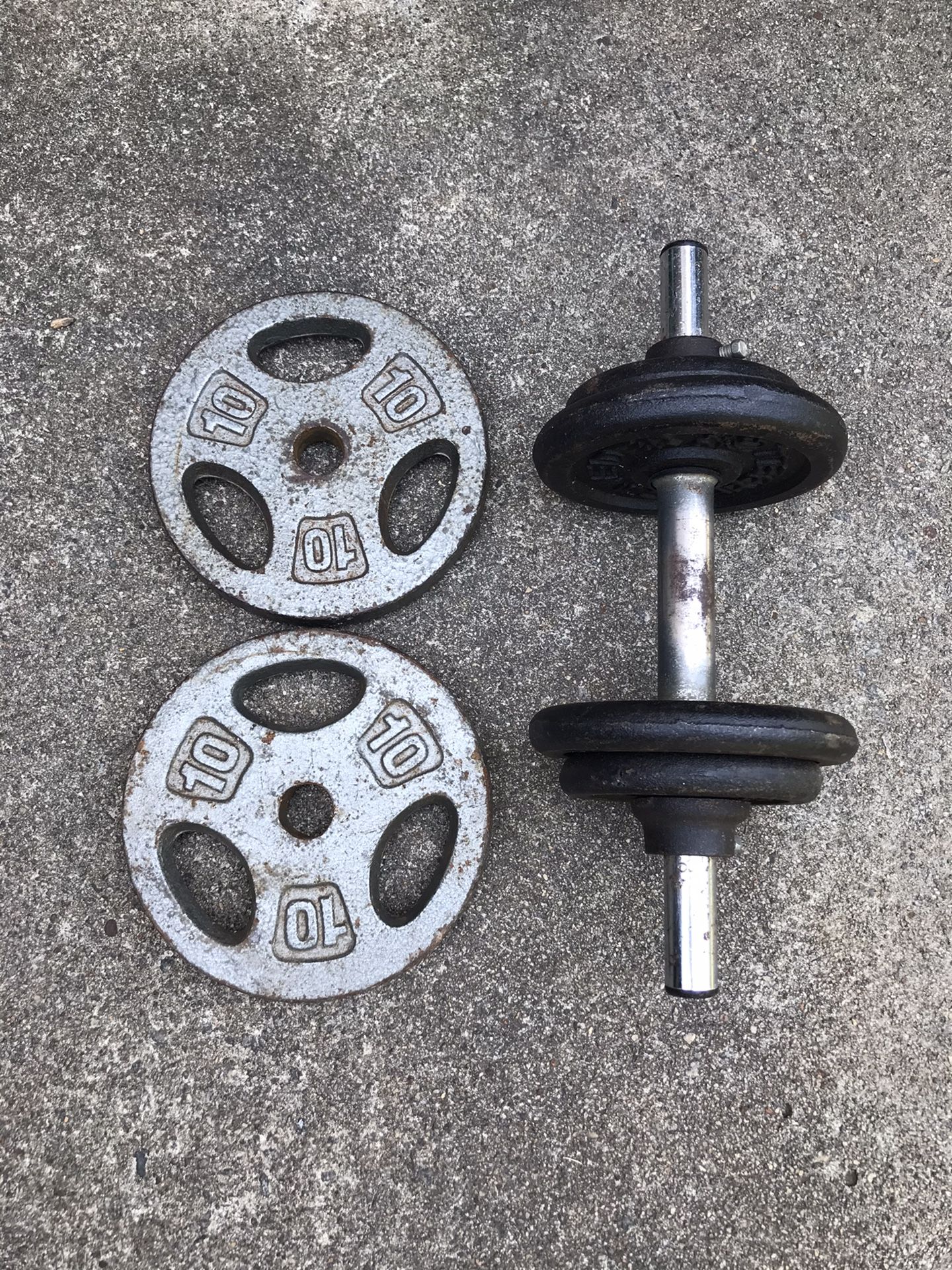 Dumbbell with 36 lbs of weight plates.