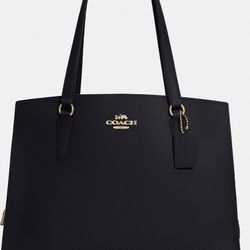 Tatum Carryall 40 

COLOR: GOLD/MIDNIGHT OXBLOOD
