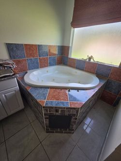 Corner Jetted Whirlpool Bathtub