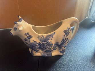 Blue and white cow pitcher