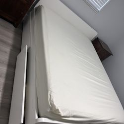 Free queen size bed frame with four under drawers