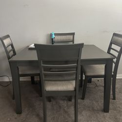 4 Chairs And Table 