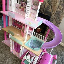 Barbie Dreamhouse dollhouse with pool, slide & elevator