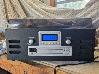 Encore Technology AM/FM, CD, Cassette, Turntable and more all in one.
