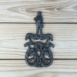 Vintage Cast Iron Cherubs/Man Trivet 