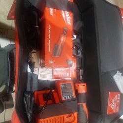 Milwaukee  New Ratchet M2   3/8  New Charger  And Ne Bag 120.00