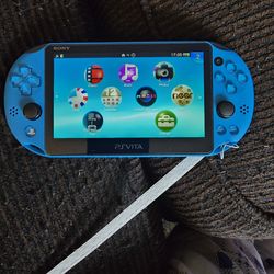 Ps vita 2000 with extras