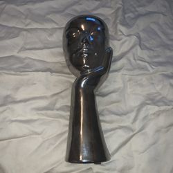 Head on Hand Art Piece