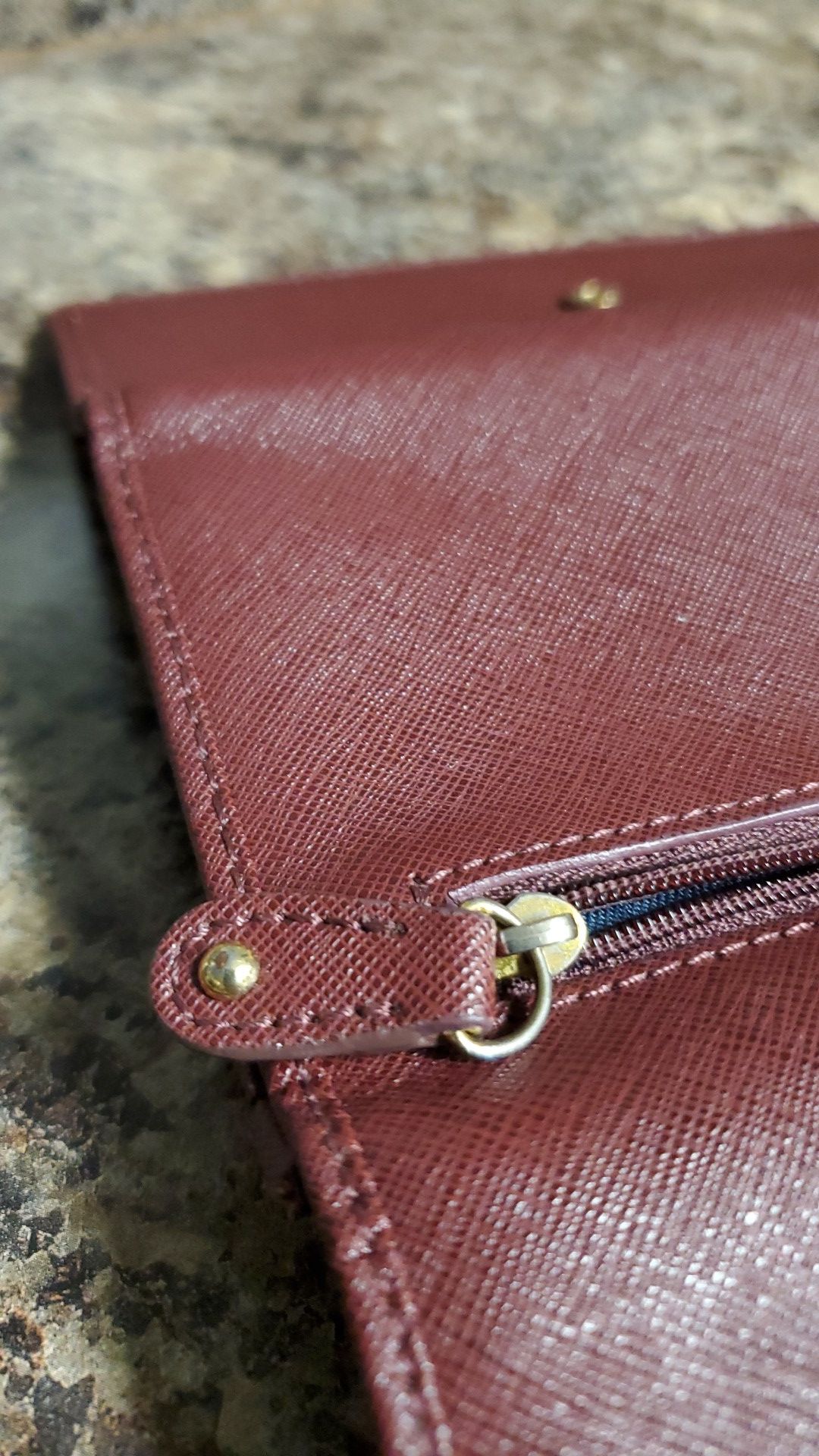 Maroon Tommy Hilfiger wallet.