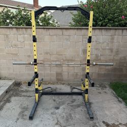 To post weight rack with curl bar and Olympic bench bar