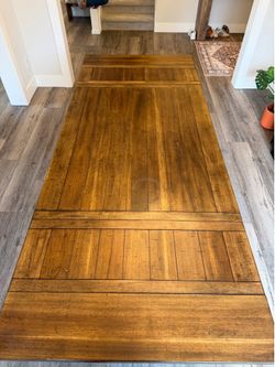 Rustic wood extended dining table