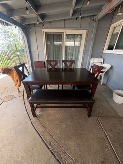 Wooden dinner table and chairs