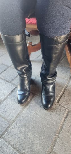 New black boots, size 10.