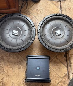 Two kicker subwoofers and amp
