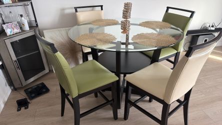 Glass table plus 4 nice chairs  $250