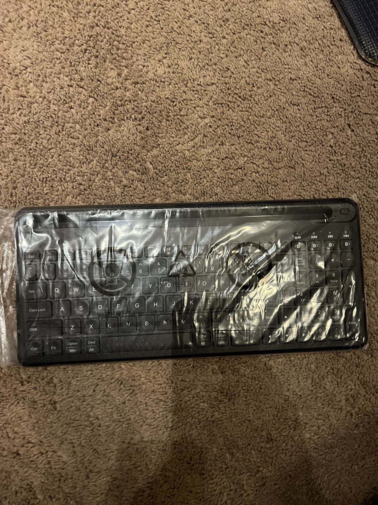 Brand New Rechargeable 7 Color Bluetooth Keyboard