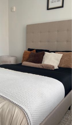 Beige Upholstered Bed Frame with Tufted Headboard