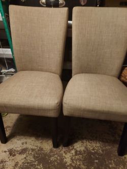 2 cream and wood Chairs $10 each