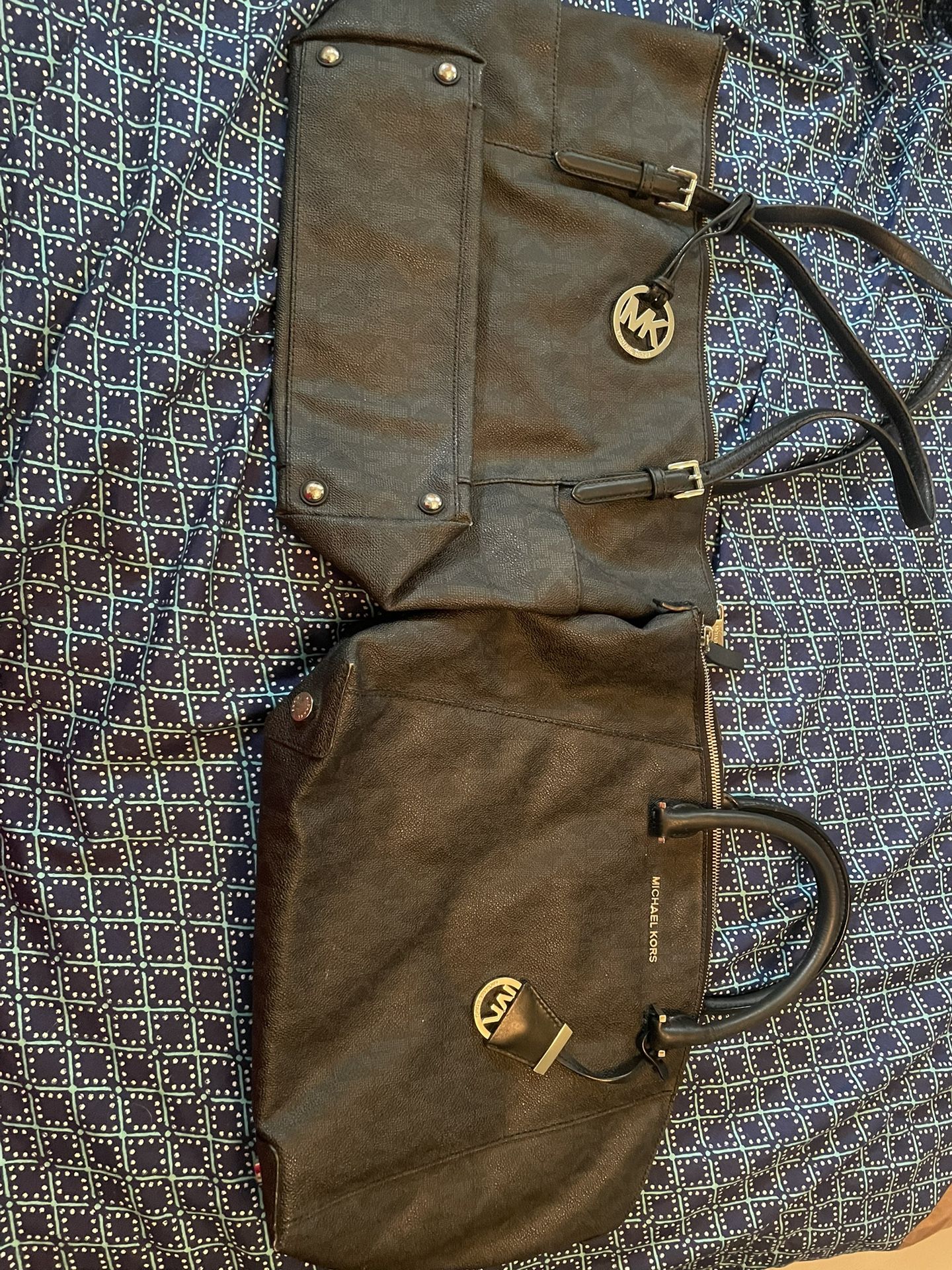 Black Michael Kors medium size purse with gray MK all over outside both and perfect condition prices for one