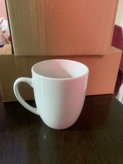 4 new mugs open box
