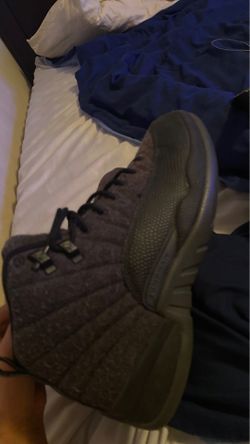 Size 9 Jordan 12’s slide up