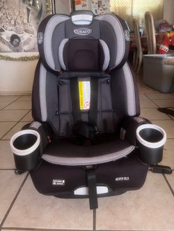 Reclining Graco 4 ever DLX car seat