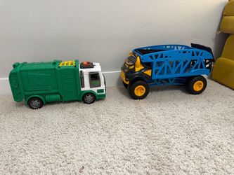Garbage truck and monster transport truck