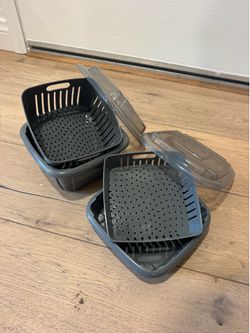 2 grey berry boxes. One small pint size. One larger size. Used twice. MOVING SALE