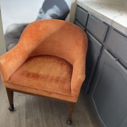 RARE VINTAGE designer Martin Brattrud Orange Crushed Velvet 1970 Russet Armchair Rolling Wheels mod style  24” width  Height 30”  Chair height 16”  On