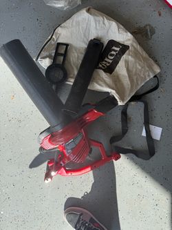 Leaf blower and vacuum with bag