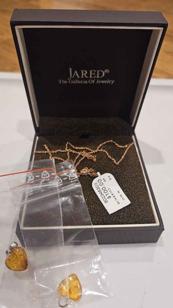 Gold Necklace with Heart Pendants