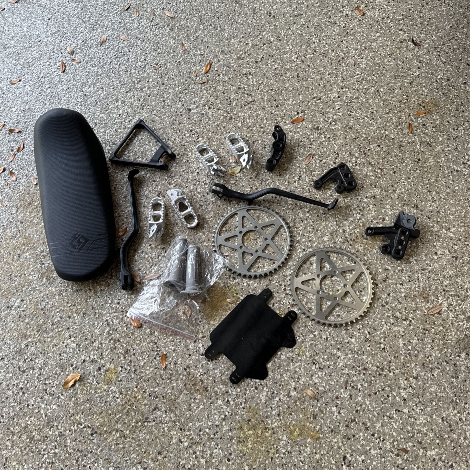 Bunch of Surron Stock Parts