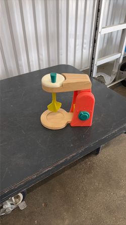 Very cute little girls, plastic and wooden mixer