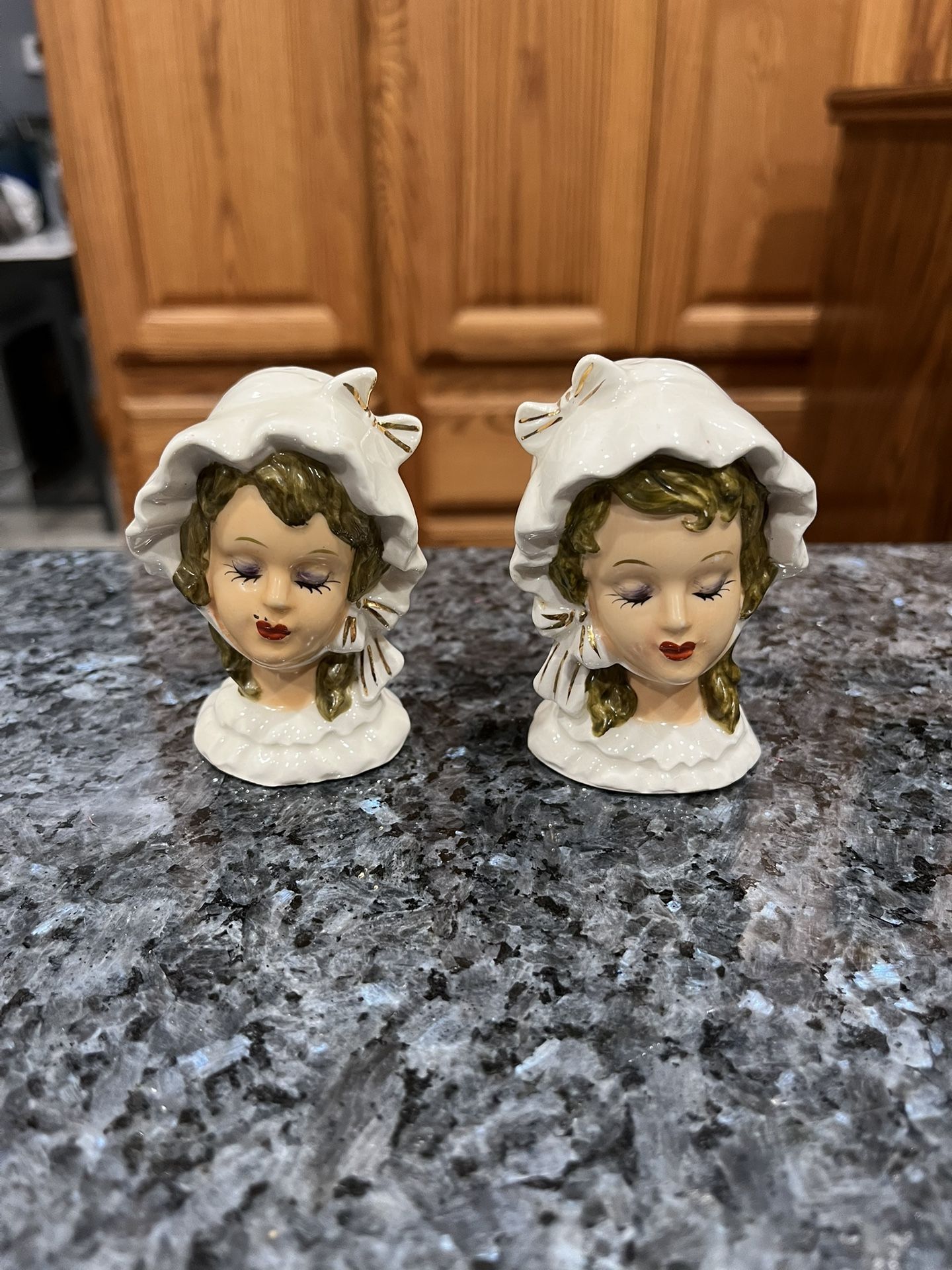 Vintage Collectible Salt and Pepper shaker, women with bonnets, ceramic hand painted.  Preowned one lady has a black ink mark by her mouth see picture