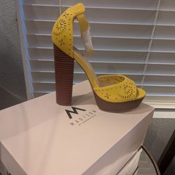 Yellow high heels