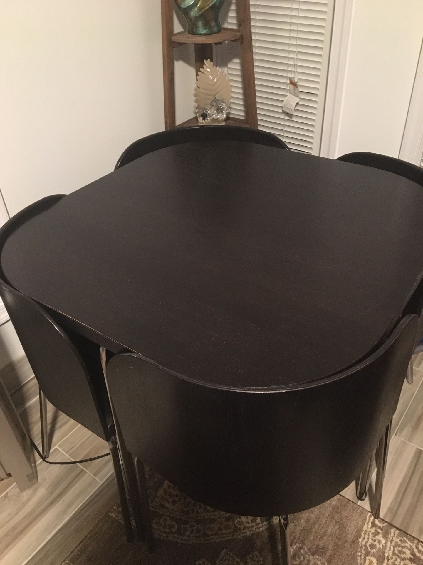 IKEA dining table with four chairs